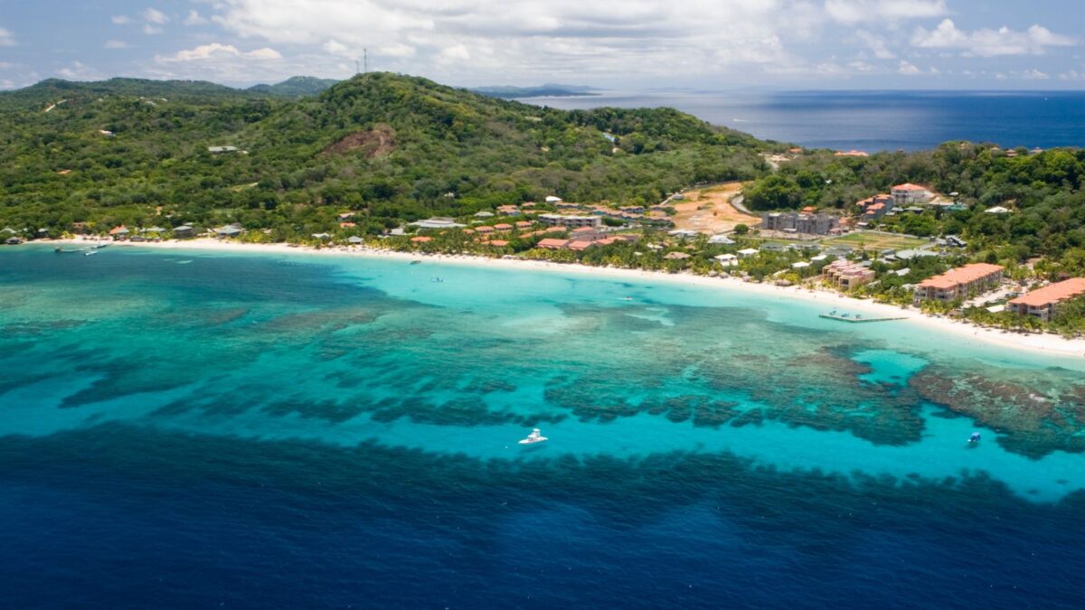 <p>West Bay Beach in Roatan is the go-to spot. It is known as the longest beach on the island and is full of awesome restaurants, bars, dive shops, and tons of water sports. </p><p>It’s the ultimate place on the island for a good time and has many things to explore and enjoy. If you’re looking for a lively vibe and a bunch of activities, West Bay Beach is the place to hit up.</p>