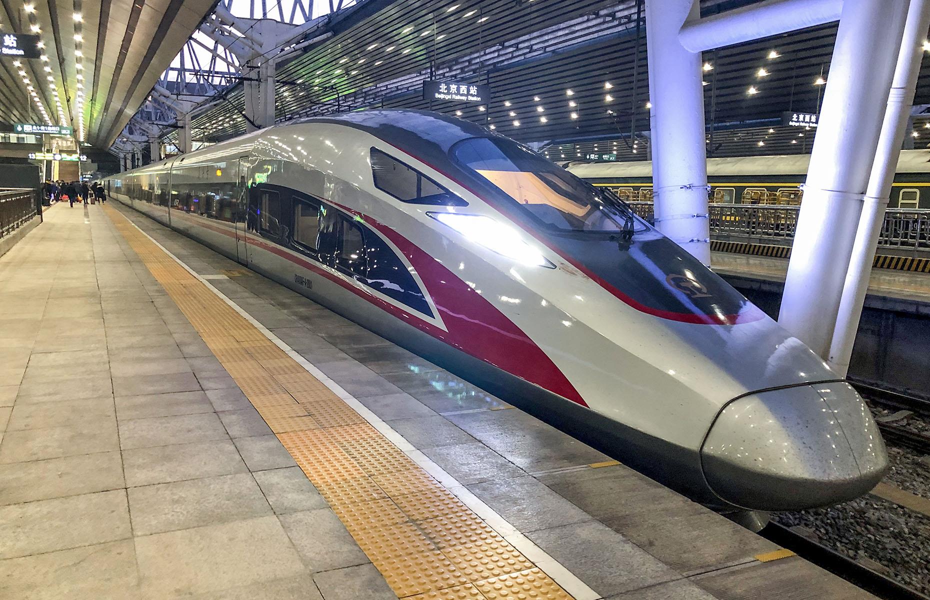 <p>In 2011, China overtook Japan as the country with the highest number of high-speed rail (HSR) passengers – a remarkable feat for a country that didn't have any high-speed rail lines at the start of the century. At its peak in 2019, 2.29 billion people rode China's HSR rails. Today, China boasts 26,000 miles of high-speed tracks, which is longer than the circumference of the Earth. This aerodynamic G20 train, pictured, travels along the Beijing to Hong Kong line, which opened in 2018. Its sleek body and elongated nose show just how much trains have developed over the decades.</p>