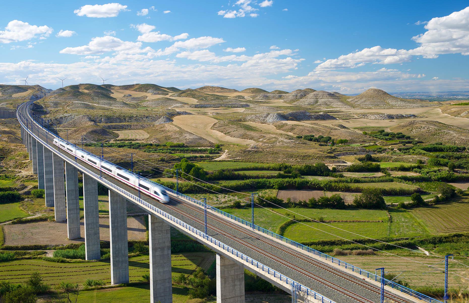 <p>In 2023, Spain announced funding for research into a high-speed rail link to Morocco – 14 years after the idea was originally raised. The line will be the first to connect Europe and Africa, bridging nine miles (14km) between the two continents. Current plans suggest it would run beneath the strait of Gibraltar, much like the Channel Tunnel links England and France. The line would likely link Tarifa or Algeciras in Spain to Tangier station in Morocco. These days, high speed trains such as this one (pictured) crossing a viaduct in Spain reach speeds of between 124 and 221 miles per hour (200-355km/h) – a far cry from the early days of train travel.</p>  <p><strong>Liked this? Click on the Follow button above for more great stories from loveEXPLORING</strong></p>  <p><strong><a href="https://www.loveexploring.com/galleries/86683/the-worlds-most-scenic-train-journeys-that-dont-cost-a-fortune?page=1">Now discover the world's most scenic train journeys that don't cost a fortune</a></strong></p>