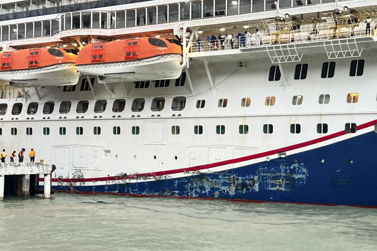 PHOTOS: Carnival cruise ship damaged after slamming into pier amid strong winds