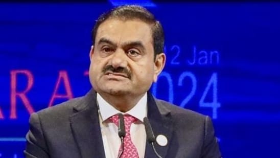 a year after hindenburg report, how adani group firm stocks are performing?
