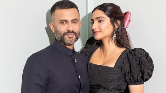 Sonam Kapoor Sizzles In Dior Dress, Anand Ahuja Opts For Indian Wear At ...