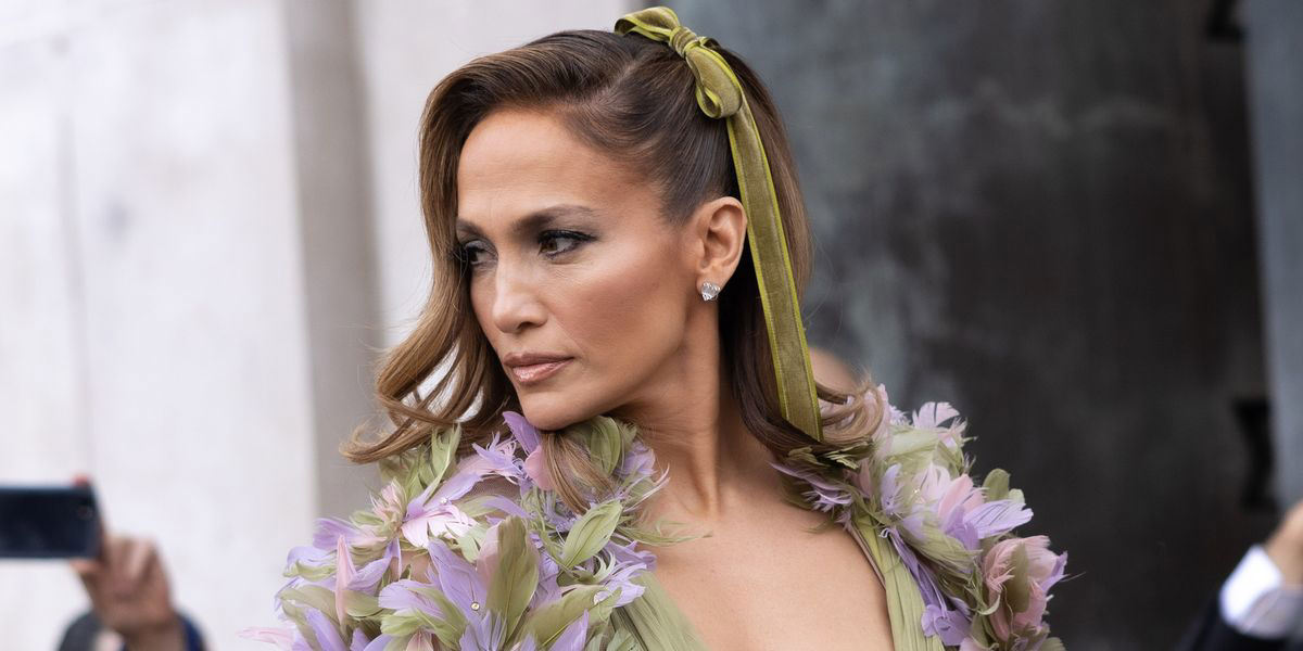 Jennifer Lopez Stuns in a Flower-Adorned Plunge Dress at Elie Saab’s ...