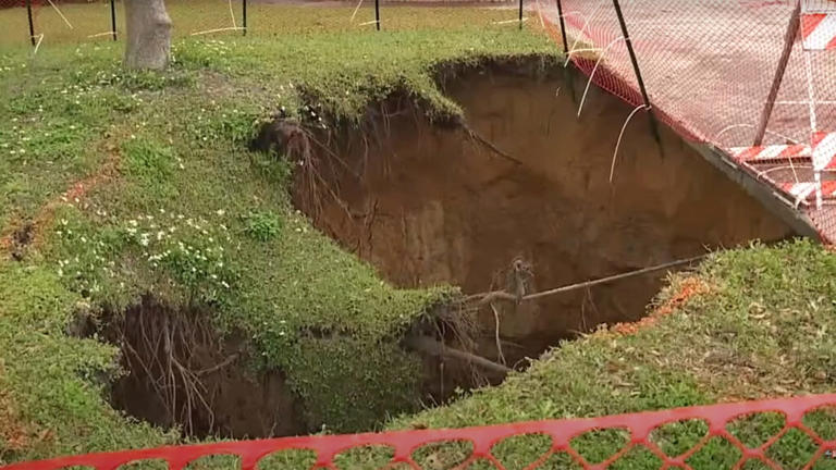 Massive Sinkhole, 70 Feet Deep and Still Growing, Appears on Florida Lawn