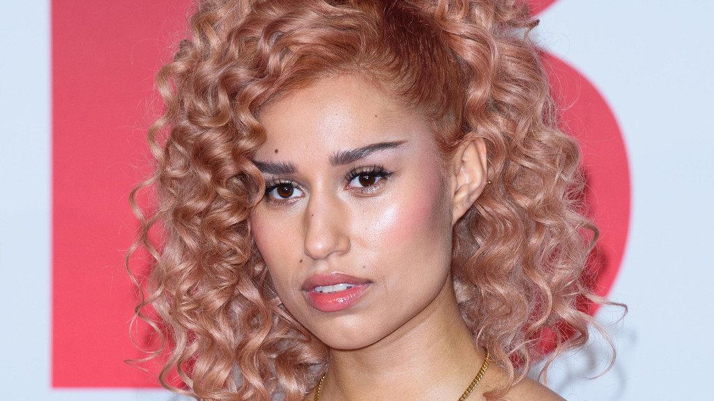 Raye Breaks Record For Most BRIT Awards Nominations In A Single Year