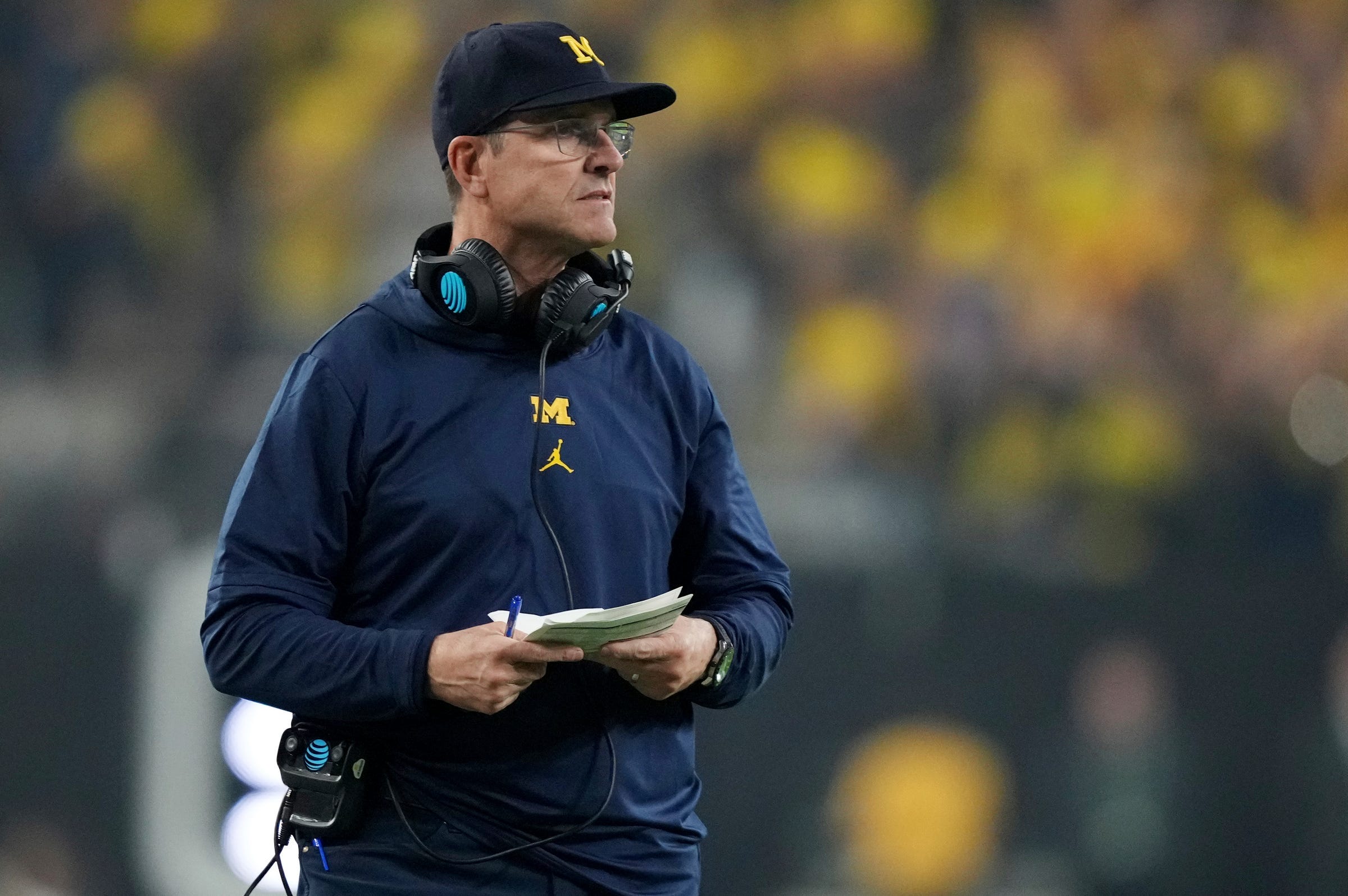 jim harbaugh leaving michigan to become head coach of los angeles chargers