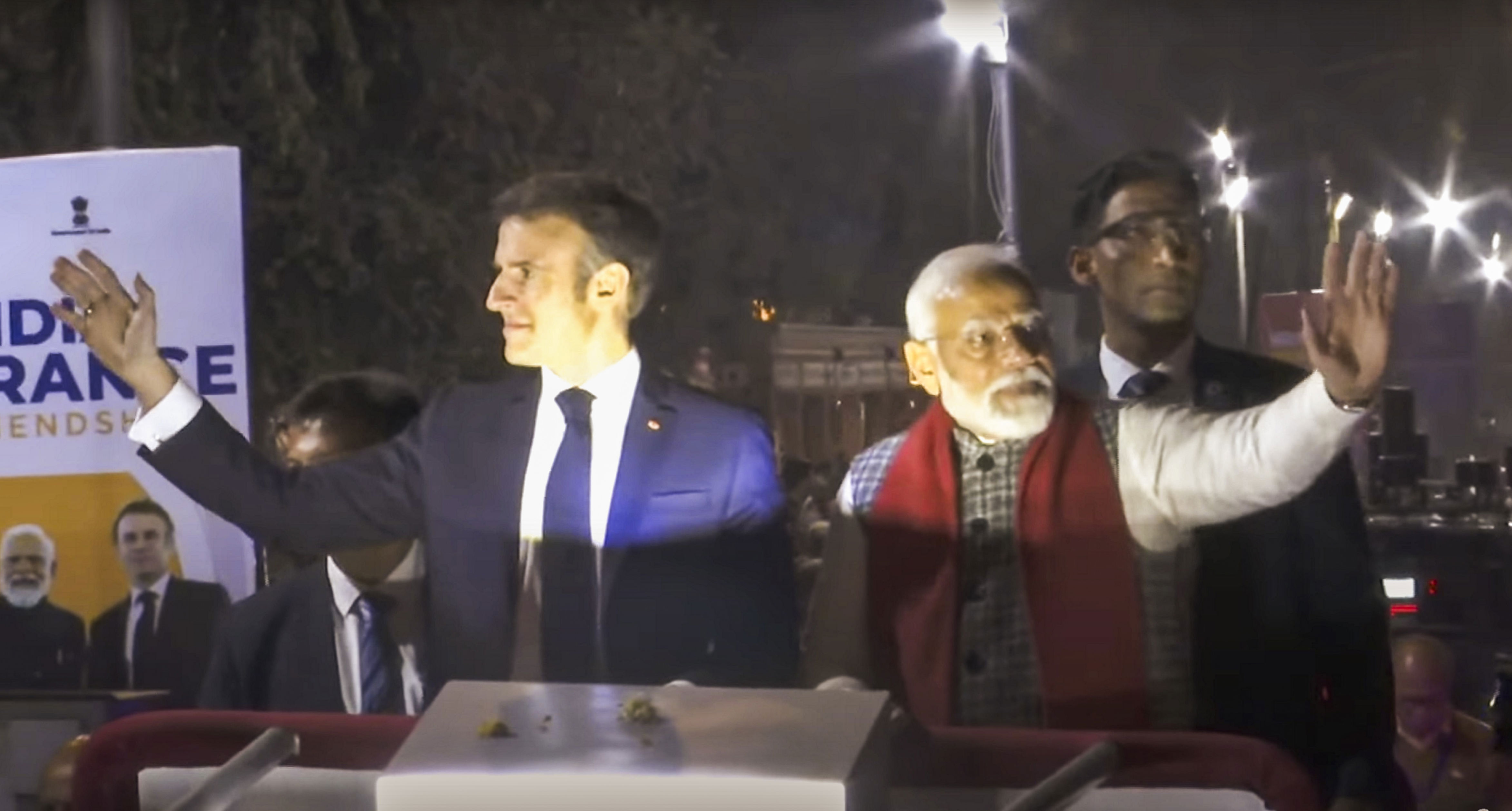 when macron met modi: french leader joins pm in roadshow, gets ram temple replica as gift