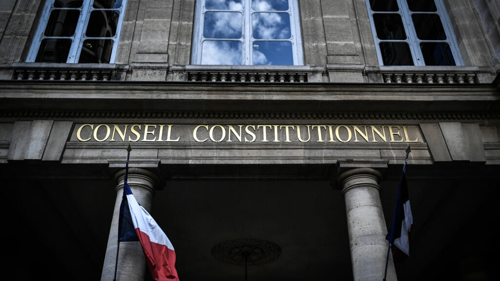 french court scraps large parts of hardline immigration law as unconstitutional