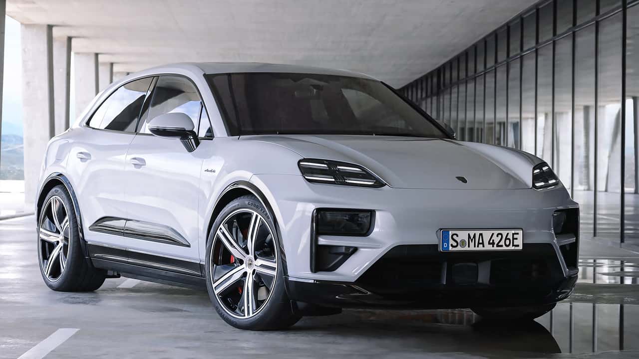 porsche taycan sales cut in half in q1 2024, new version is coming in april