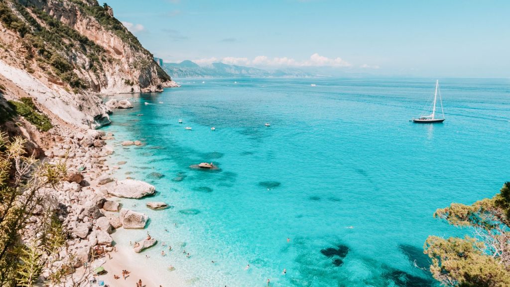 <p>Soft white sands and clear, azure waters await at Cala Goloritzè on the <a href="https://worldwildschooling.com/europe/italy/">Italian</a> island of Sardinia. It can only be accessed via an hour’s hike from Golgo Plateau or by boat, adding to the sense of seclusion. If you want to do more than laze on the sand while gazing at the views, climb needle-like Aguglia di Goloritzé or do some snorkeling to spot colorful fish. </p><p class="has-text-align-center has-medium-font-size">Read also: <a href="https://worldwildschooling.com/underrated-places-in-the-mediterranean/">Hidden Gems in the Mediterranean</a></p>