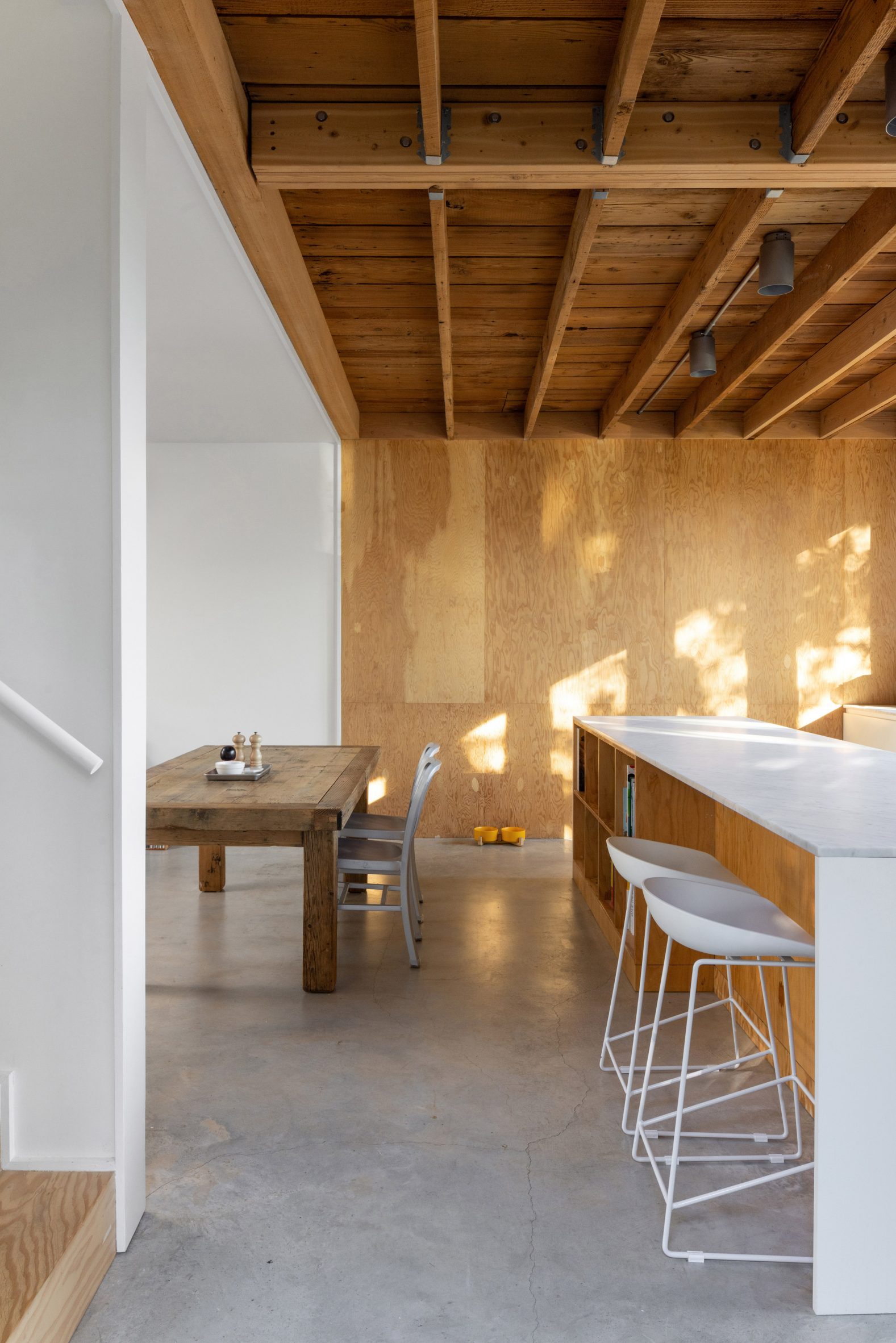 d’arcy jones adds subterranean garage to century-old house in vancouver