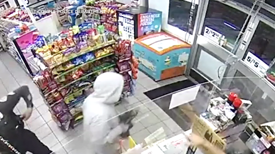 Police Officer Walks In On An Armed Robbery In Progress. See What ...