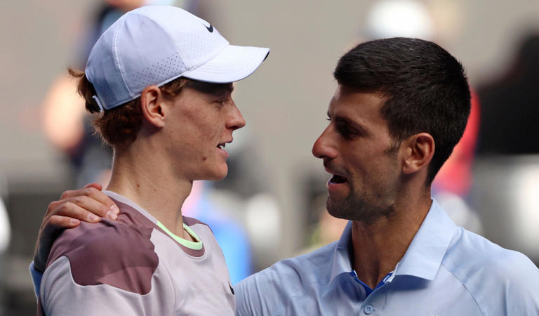 Jannik Sinner and Novak Djokovic after their Australian Open match