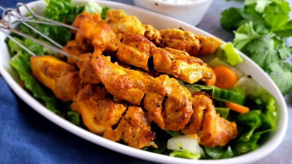 <p>This chicken tikka kebab uses aromatic spices and yogurt for marination and then grilled to perfection to get a flavorful and succulent chicken on the skewer. Perfect for a light lunch or barbecue menu. </p><p><strong>Get the recipe: </strong><a href="https://soyummyrecipes.com/chicken-tikka/">Chicken Tikka Recipe</a></p>