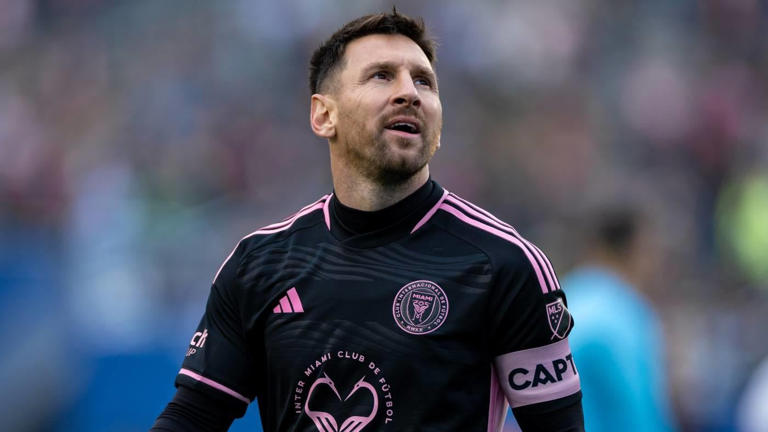 LOOK: Inter Miami star Lionel Messi signs jersey for fan while stopped ...