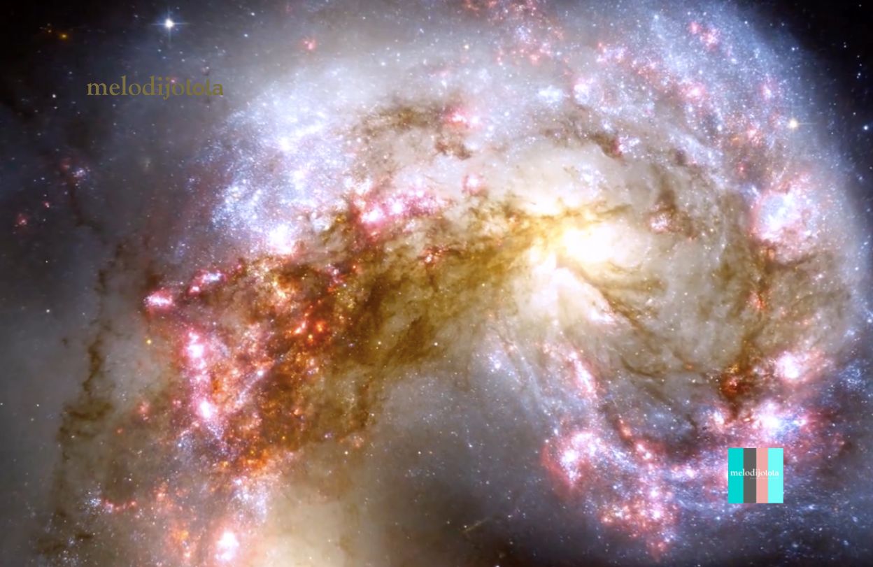 telescopio hubble de la nasa capta una galaxia torcida que interactúa con otra