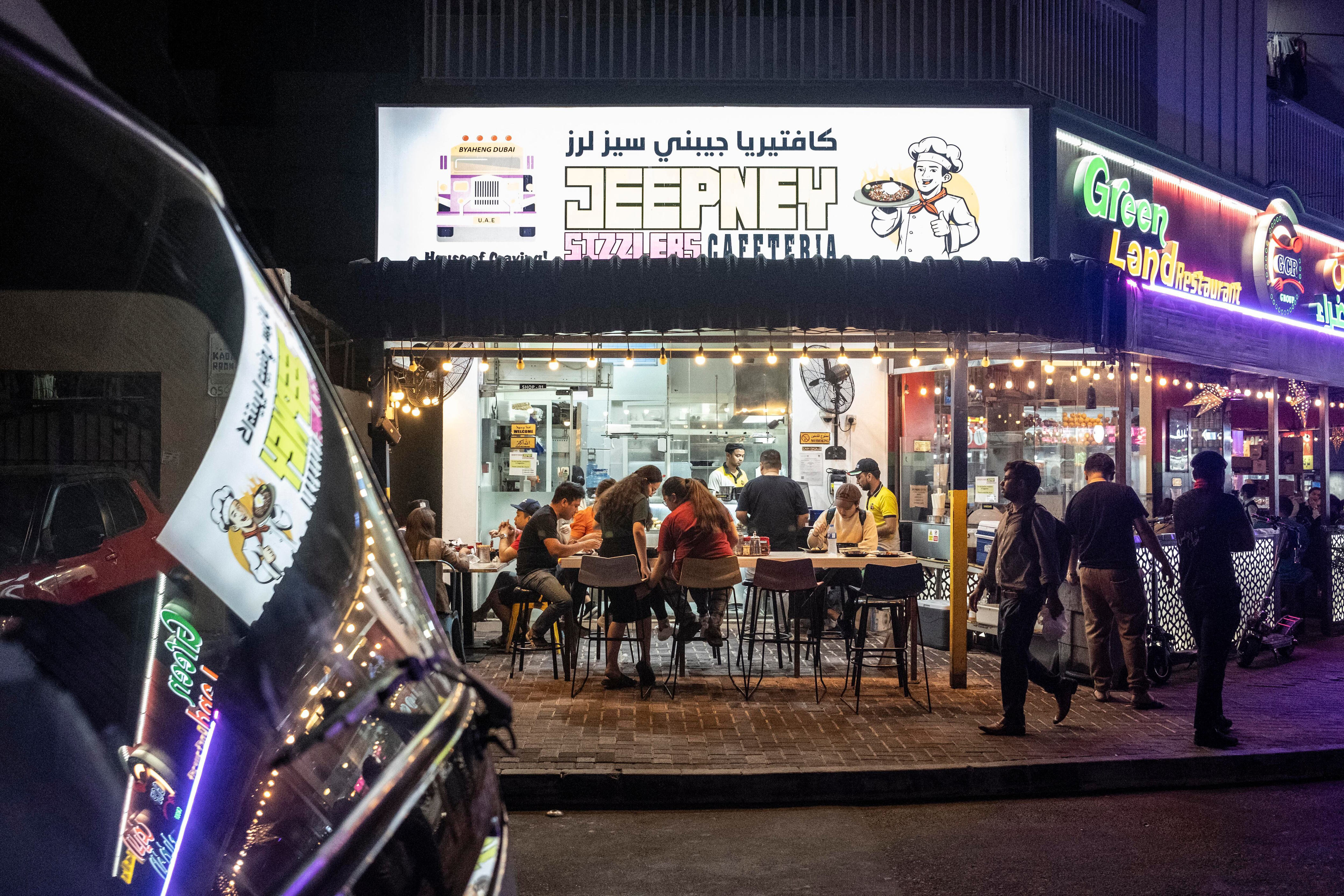 roadside kitchen in dubai transports filipinos back to manila's bustling streets