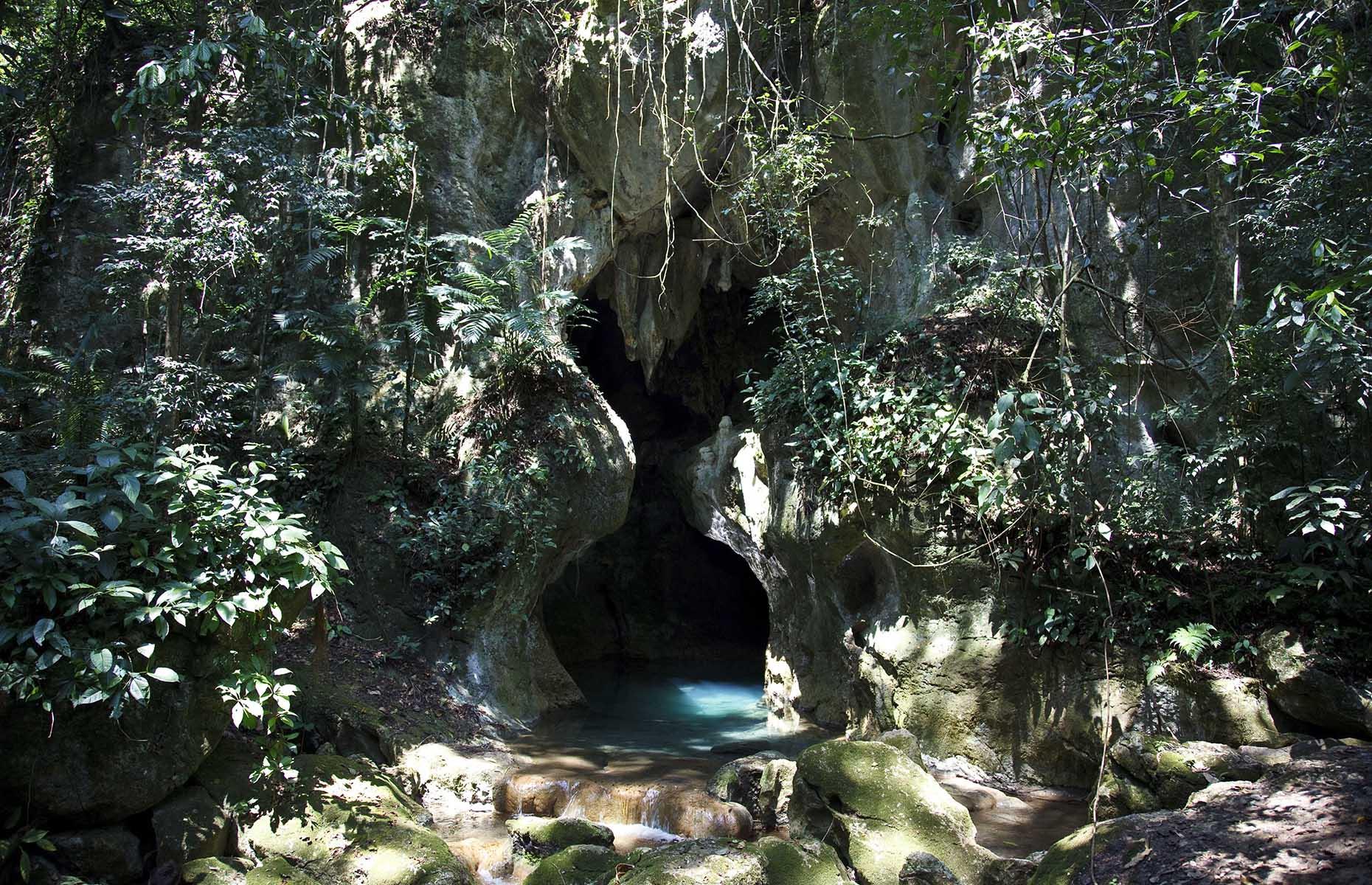 <p>Belize has literally thousands of caves, several of which are popular with tourists, but only one of them starred in an episode of <em>Ghost Hunters</em> and appeared at the top of <em>National Geographic</em>'s list of the world's top 10 most sacred caves. The Actun Tunichil Muknal Cave – known as the ATM Cave – near the mountain town of San Ignacio is a labyrinthine network of subterranean passages that visitors must hike, wade and swim to traverse. It's also a former center of Mayan spirituality that still boasts stoneware, skeletons and ceramics. Book tickets in advance – you can't enter the cave without a guide, and there's a cap of 125 visitors per day.</p>