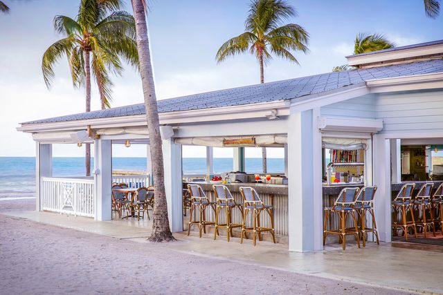 this charming key west, florida, hotel has 3 sparkling pools, a private beach, and activities that make you feel like a local