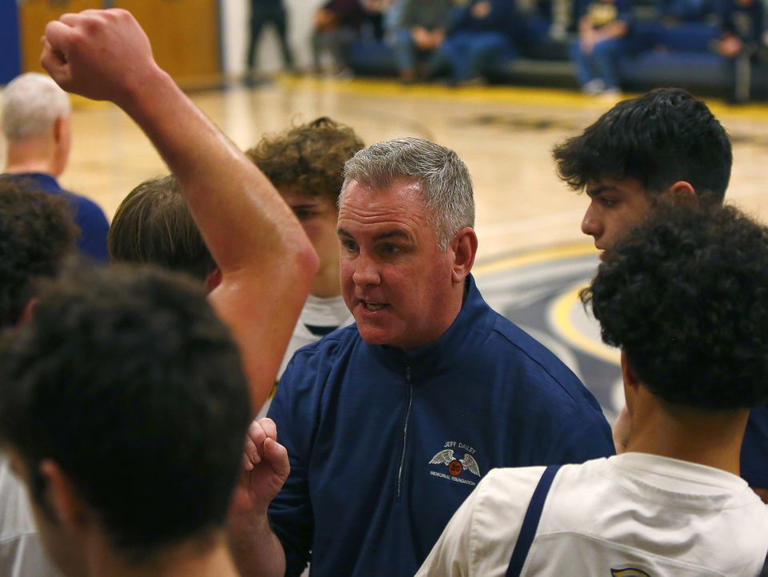 Notre Dame coach Pat Boyle addresses his team after the first quarter of a game against Bangor on Jan. 26, 2024.