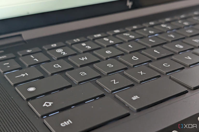 The backlit keyboard on the HP Chromebook Plus x360 Laptop 14ct, showing the power button on the left