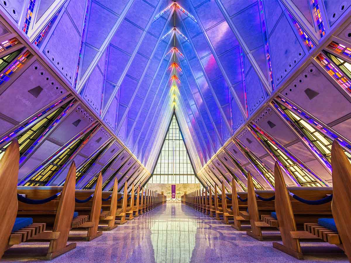 <p>Perched against the Rocky Mountains, the Air Force Academy Cadet Chapel in Colorado Springs, Colorado, captivates with its modernist design. A striking interplay of aluminum, glass, and steel, this iconic Christian attraction symbolizes strength and grace. Its soaring spires and luminous interior create a sacred space for reflection and worship.</p>