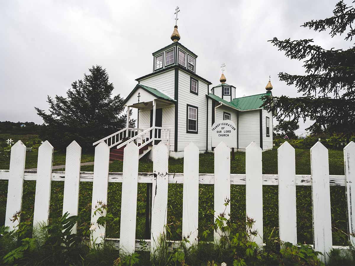 <p>Located in Ninilchik, Alaska, the Holy Transfiguration of Our Lord Chapel is a Russian Orthodox Church built in 1901. On the coast of the Cook Inlet, this church overlooks beautiful Alaskan scenery. The town below it offers fishing charters, fresh seafood, and cafes.</p>