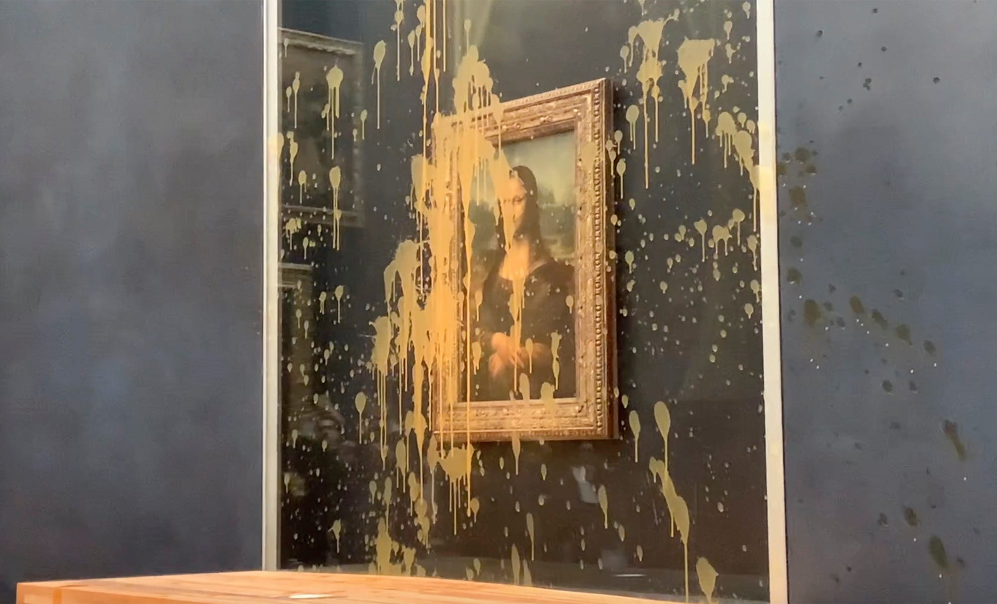 climate activists throw soup at the mona lisa in protest for farmer protections, sustainable food