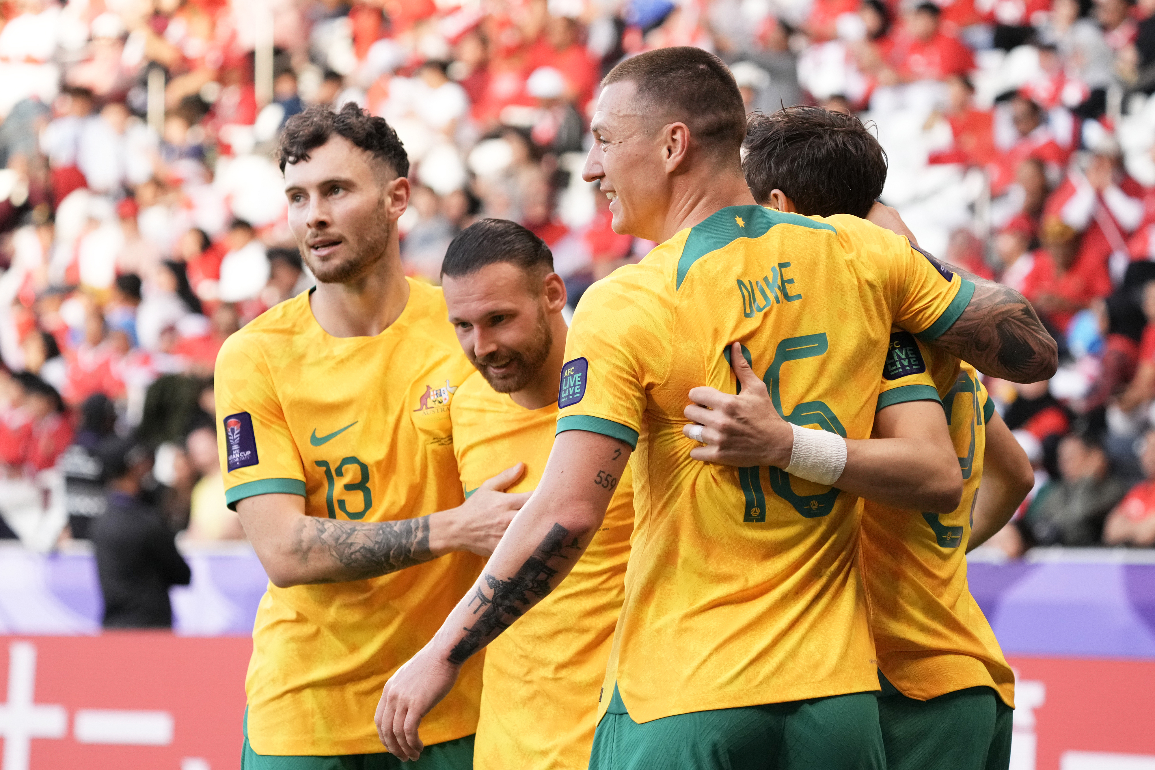 ruthless socceroos cruise into asian cup quarters