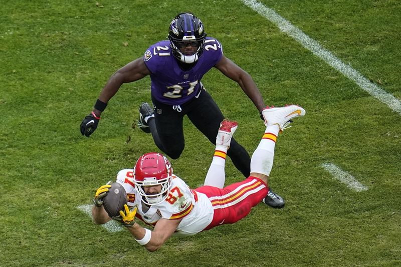 chiefs' kelce sets nfl record for postseason receptions with big first half against ravens