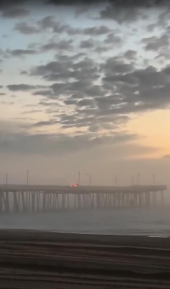 Footage Captures Car Driving Off Virginia Beach Pier As Cops Struggle