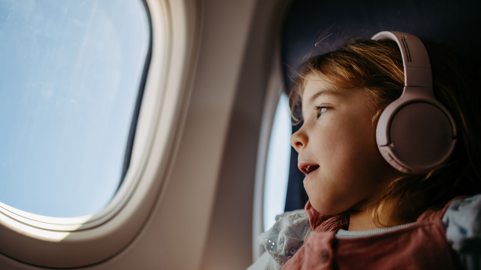 image credit: Halfpoint/Shutterstock <p>Wet wipes can be a lifesaver on long flights. Use them to wipe down your tray table, freshen up your face, or clean your hands. They’re especially handy if you’re traveling with kids. A parent on a family travel site says, “They’re perfect for quick clean-ups and feel so refreshing.”</p>