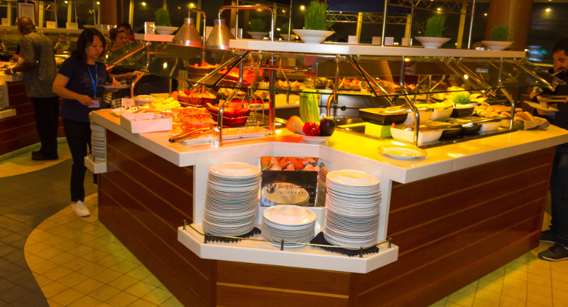 <p>Cruise buffets are tempting, but overeating can lead to discomfort and health issues. It’s better to enjoy meals in moderation and try different cuisines gradually. Remember, the buffet will be there throughout your cruise!</p>