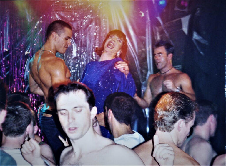 Drag queen Miss Coco Peru dances on the set of the 1999 gay romantic comedy 'Trick'. Courtesy of Jim Fall
