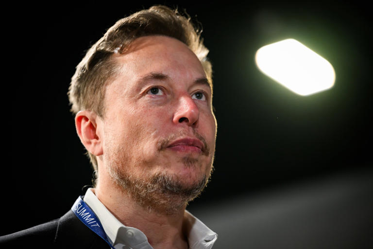 Elon Musk hopes to develop brain chips that allow people to control their phone just by thinking (Picture: Getty)