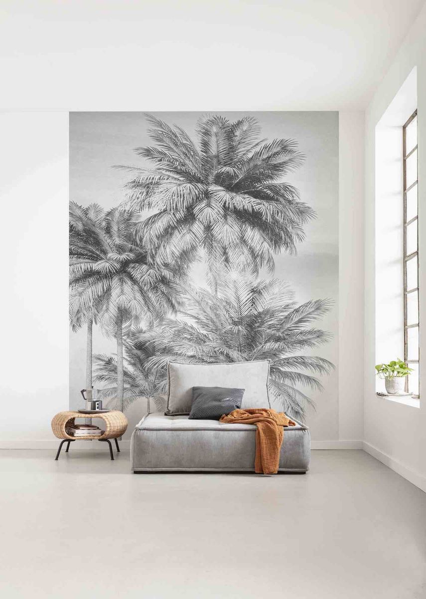 <p>In a big open area like a loft-style living room, zone the space with a huge mural. Although it's large, it's quite calming due to the grey and white monochrome palette and simple design – it looks like a painting.</p><p><em>Top Tip: </em>Murals are so versatile as they can be made to any size. </p><p><em>Pictured: Miami Palms Mural Wallpaper, <a href="https://www.foresthomesstore.com/products/miami-palms-mural-wallpaper">Forest Homes</a></em></p>