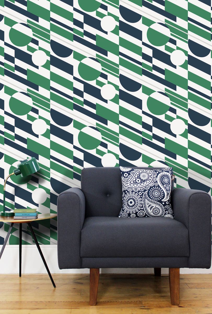<p>If mid-century is your thing, choose one of the stunning styles from Mini Moderns – this one is called <a href="https://www.minimoderns.com/product/p-l-u-t-o-wallpaper-coach-emerald-silver">P.L.U.T.O in Emerald and Silver</a>. With bold stripes and circles, this wallpaper is named after the Pipeline Under The Ocean – a WW2 fuel line built under the English Channel from Britain to France. It's eco too, printed using water based ink on papers from sustained forests. </p>