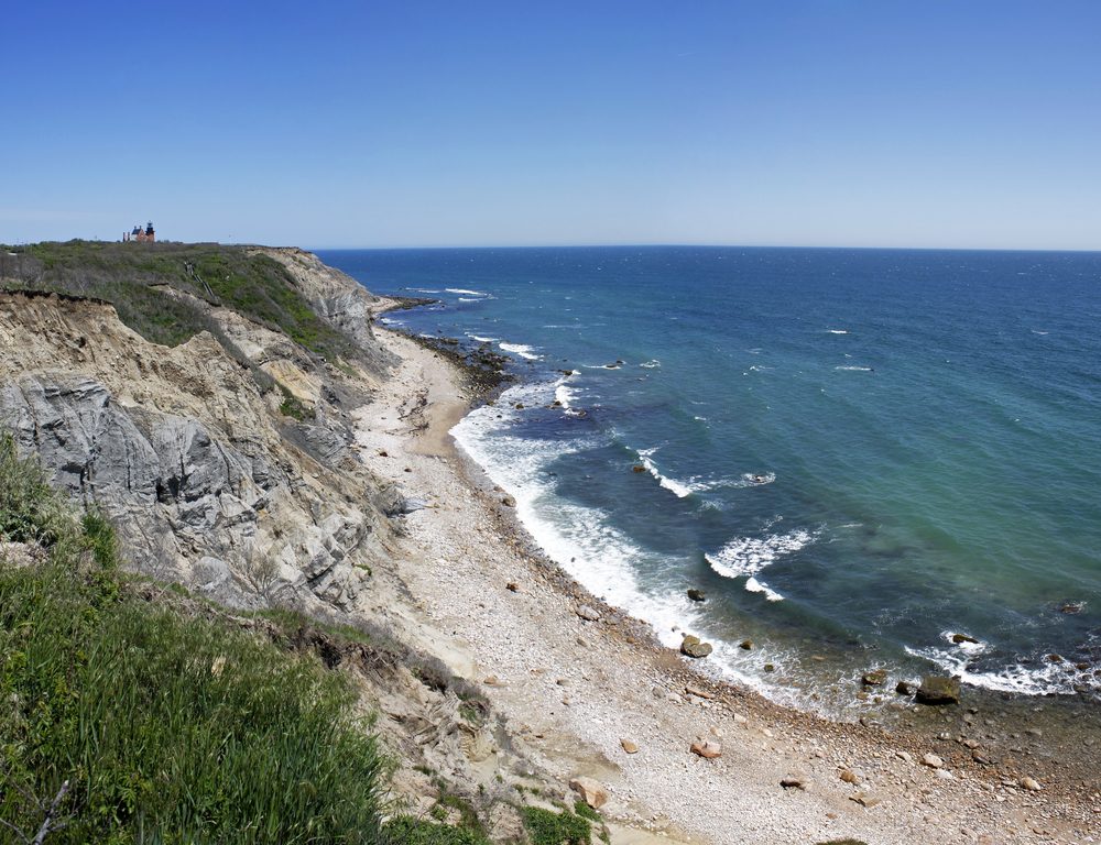 <p>Rhode Island might be the smallest state but its scenic nature getaways certainly have a big impact. Take the dramatic <a class="SWhtmlLink" href="http://www.blockislandinfo.com/island-events/mohegan-bluffs" rel="noopener noreferrer">Mohegan Bluffs</a> on Block Island, for example. From the top of the steep clay cliffs, you can see all the way to Montauk as you listen to the waves crashing against the rocky outcrops 200 feet below. You can also descend the 141 stairs to the bottom to frolic in the refreshing Atlantic surf.</p>