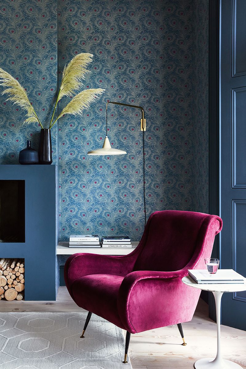 <p>The colour blue can make you feel calm and relaxed or vibrant and energised, and can work well in a living room. Complement an all-blue scheme with blue paint on doors and around fireplaces, and printed wallpaper on the four walls. This flamboyant peacock feather design provides a splash of colour.</p><p><em>Pictured: Carlton House Terrace - Blue Plume, <a href="https://www.littlegreene.com/wallpaper/collection/london-wallpapers/v/carlton-house-terrace/carlton-house-terrace-blue-plume">Little Greene</a></em></p>