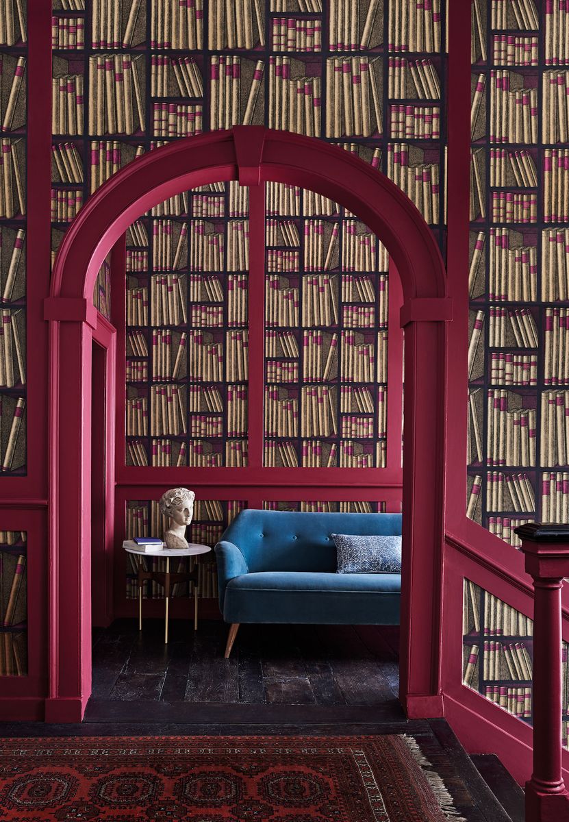 <p>If you yearn for a library or just love this quirky design, it’s been used here to great effect. Using it on the near and far walls leads you in, and it is complemented perfectly with the deep pink woodwork which echoes the spines on the 'books'.</p><p><em>Top Tip:</em> It would be great in a small space too.</p><p><em>Pictured: Fornasetti Senza Tempo Ex Libris wallpaper, <a href="https://www.cole-and-son.com/en/products/ex-libris-1?v=3861">Cole & Son</a></em></p>