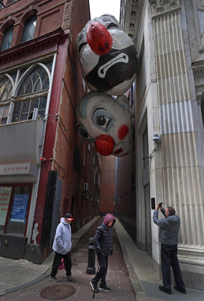 Massive clown heads in downtown Boston freak out tourists: ‘Very creepy’