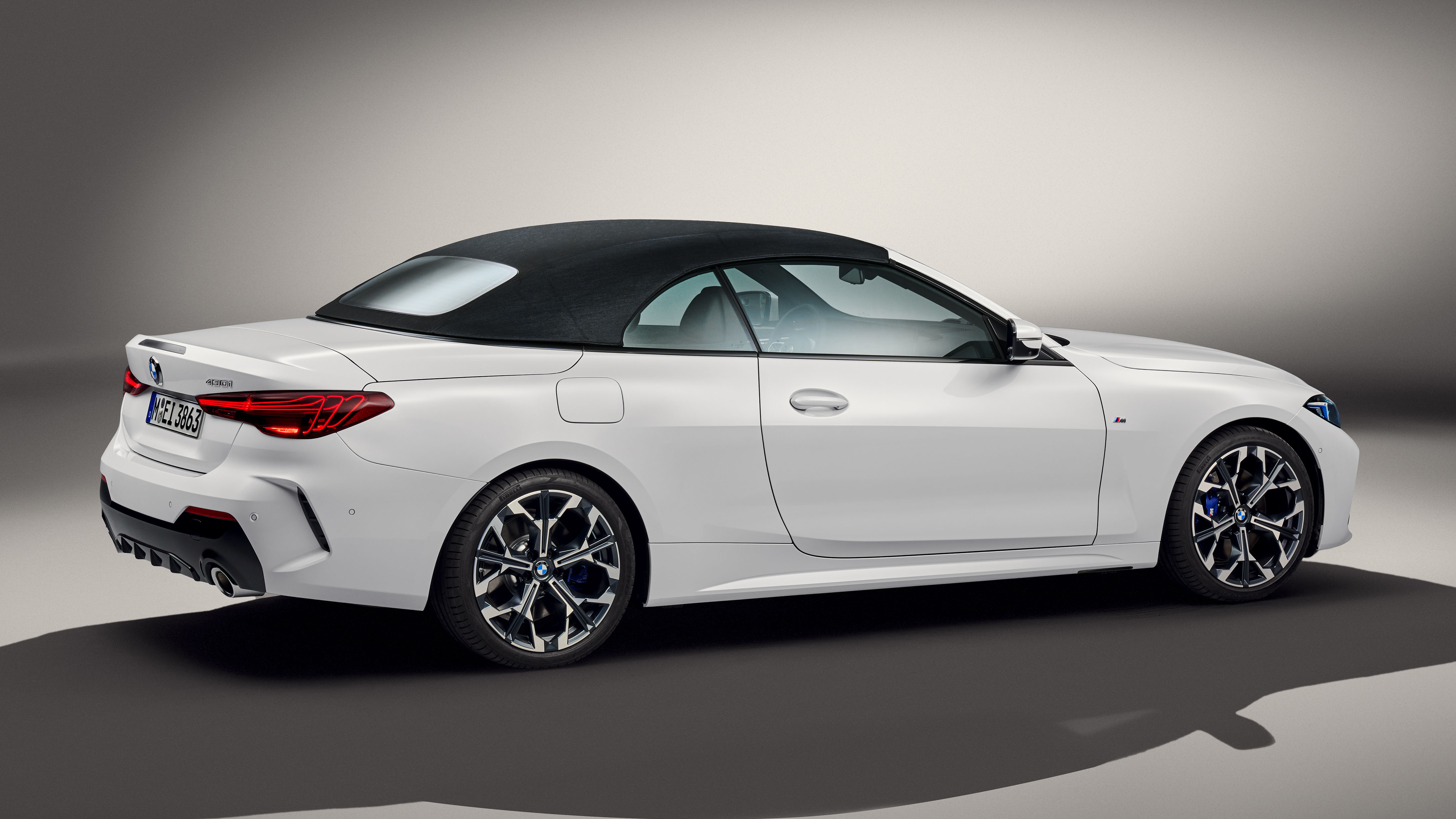 bmw reveals refreshed 4 series coupe and convertible models