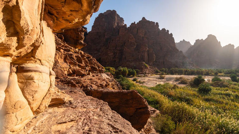 Wadi Al Disah is a green, spring-fed valley, known as “valley of the palm trees”, surrounded by towering sandstone cliffs in the mountains of southwest Tabuk province. - Didier Marti/Moment RF/Getty Images