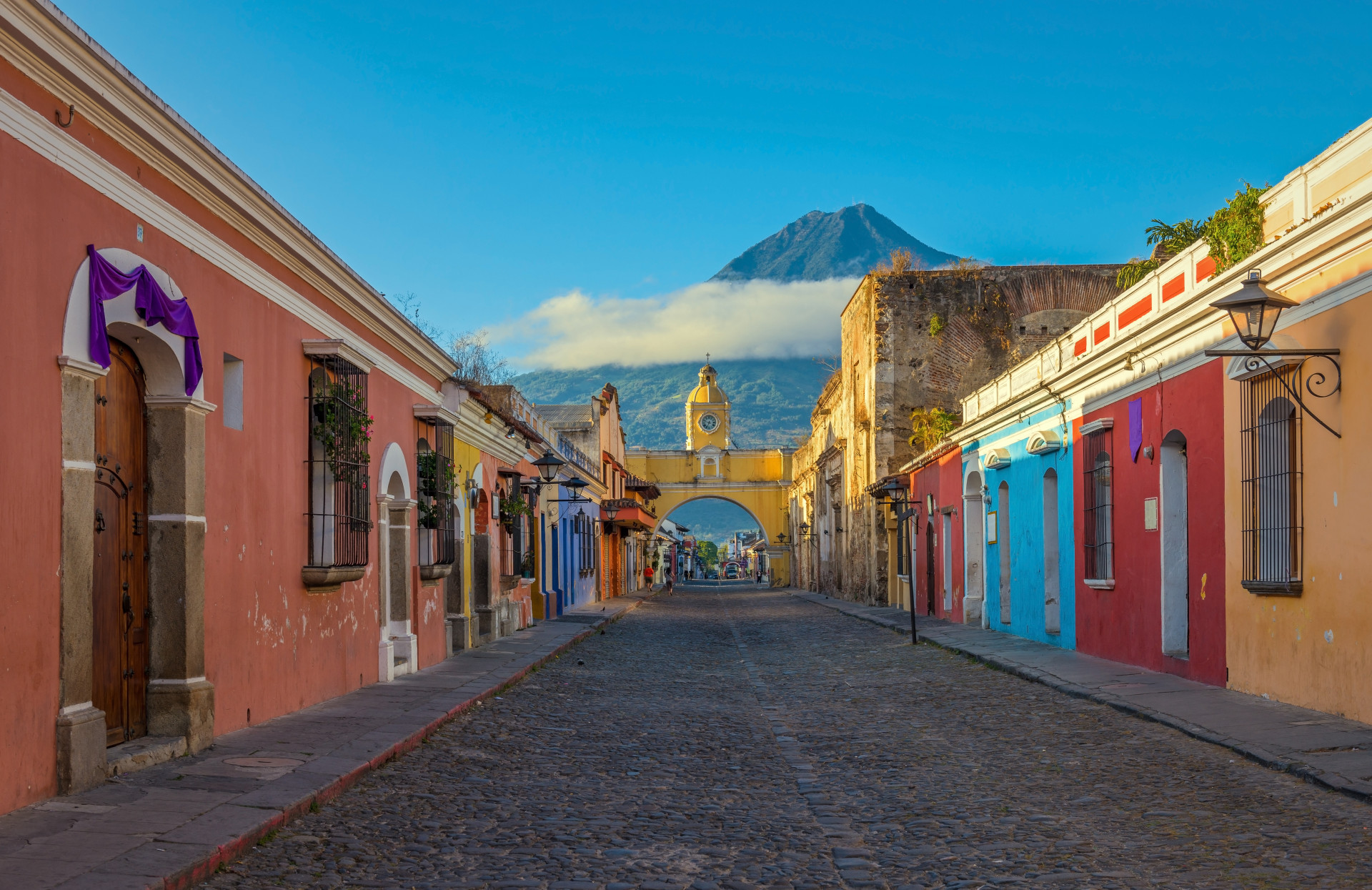 This Guatemalan city is known for being surrounded by volcanoes and for its architecture rich in baroque features.