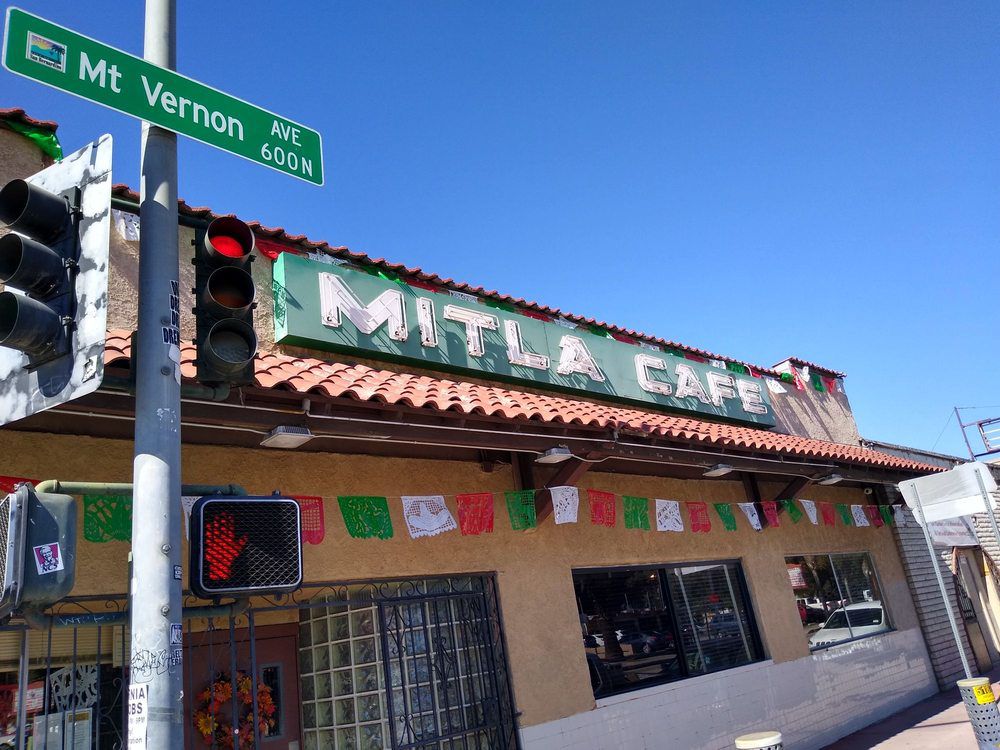 <p><b>San Bernardino, California</b></p><p>Established in 1937 by Lucia Rodriguez, <a href="https://www.mitlacafesb.com">Mitla Cafe</a> is historic in its own right, but it's more famous for who it inspired. Glen Bell had a hamburger stand across the street from the wildly popular taco-slinging spot, and got his way into the kitchen by befriending the staff. He copied the crispy tacos dorados that people lined up for in his new venture, Taco Bell, in an age-old story of appropriating minority cuisine. The original Milta Cafe is still going strong, run by Lucia's grandson and great grandson, and still serves the infinitely better version of the crisp ground beef taco. </p>