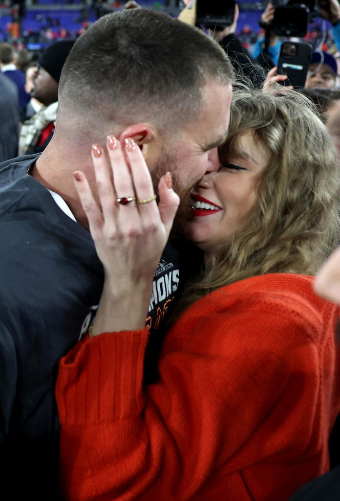 Taylor joined Travis on the football field when the Chiefs won the AFC Championship , a victory that cemented the team's spot in the 2024 Super Bowl . The couple shared a celebratory kiss before exchanging the L-word . "Tay, I'm gonna enjoy with the guys," he told her. "I love you—so much it's not funny."