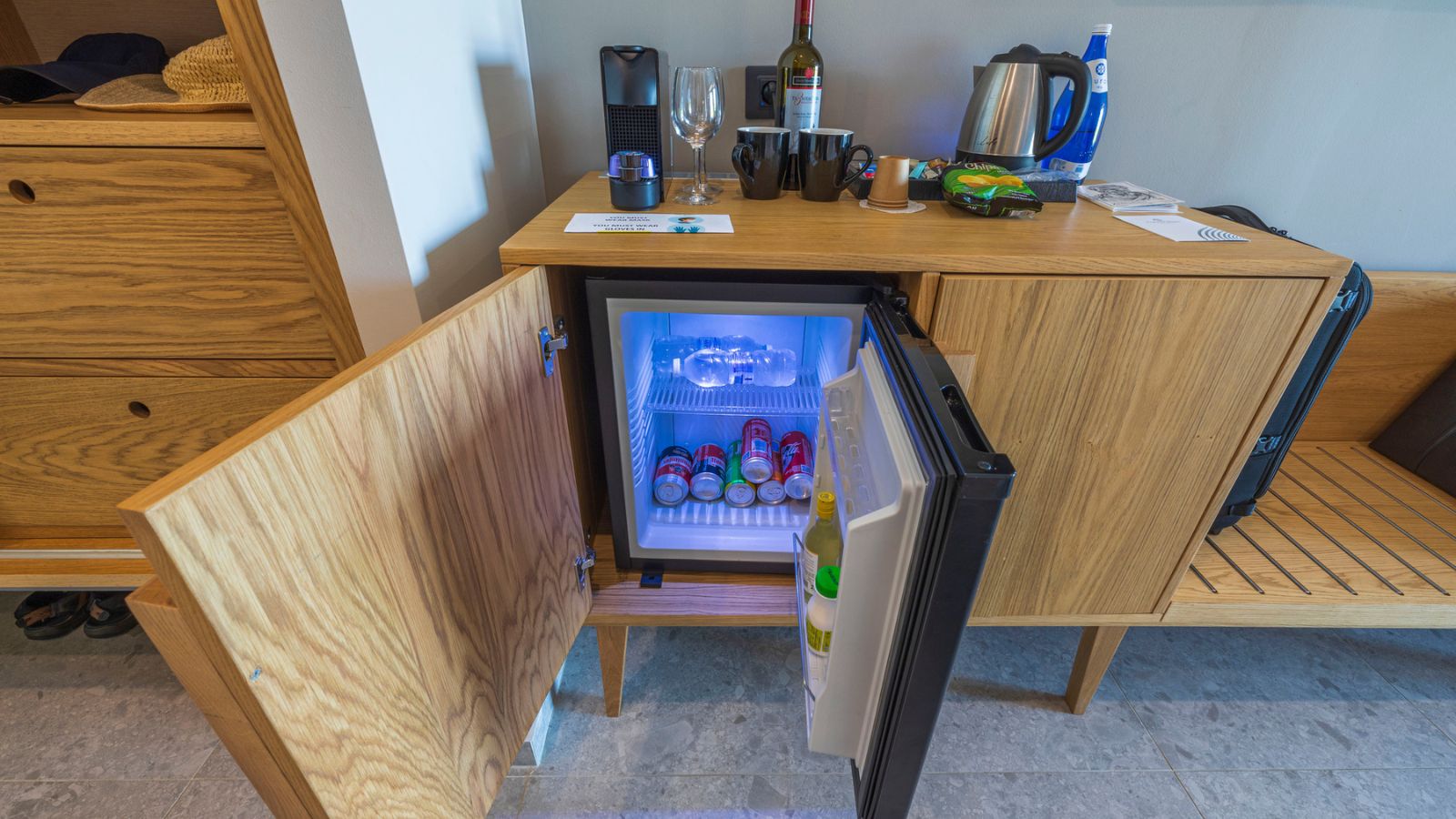 <p>Minibars in hotels tend to be significantly overpriced. It's recommended to avoid them altogether because you can typically find similar items at local stores for much cheaper prices. Save money by purchasing what you need from nearby stores rather than indulging in the convenience of the minibar.</p>