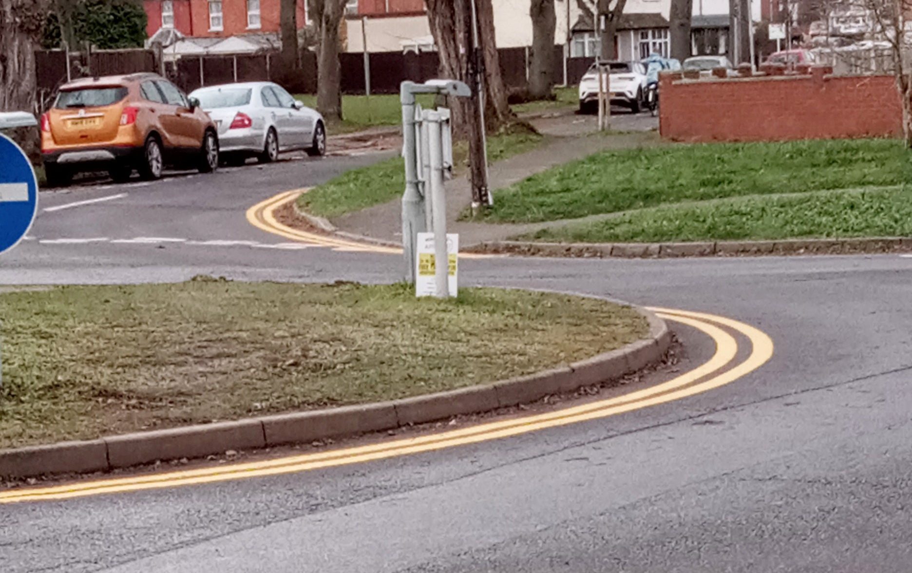 round the bend: council criticised over double yellow lines on roundabout