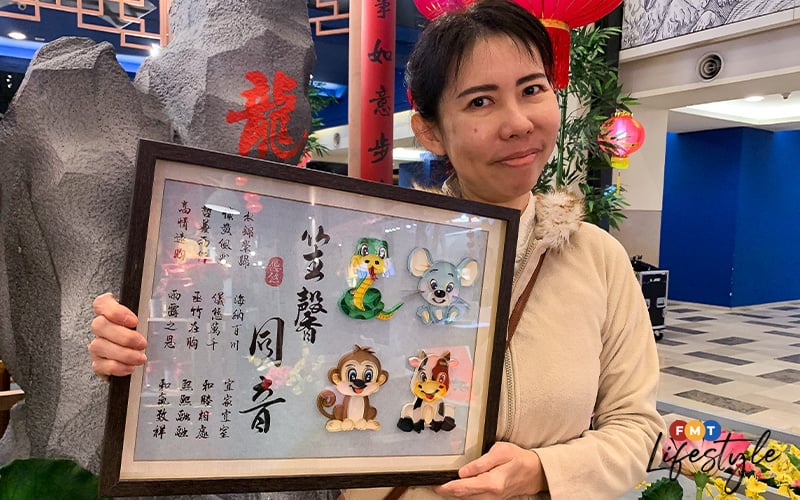 chinese calligraphy artist continues to inspire despite illness