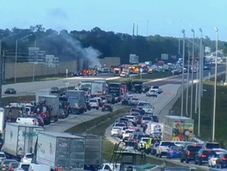 At least 2 dead after small plane crashes onto highway Authorities